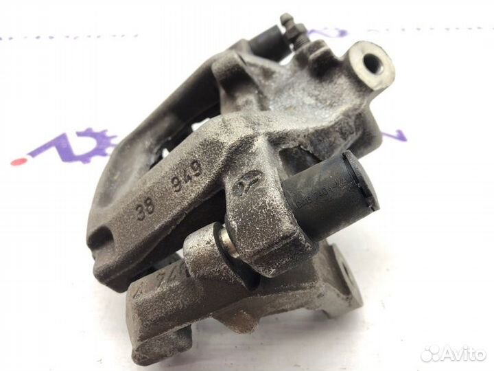 Суппорт тормозной задний левый Mercedes C-Class