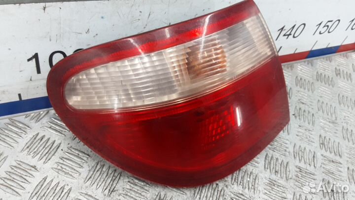 Фонарь задний левый Nissan Almera