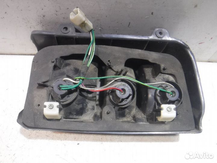 Фонарь задний левый Mitsubishi L300