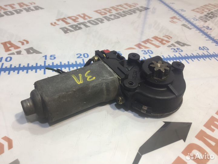 Моторчик стеклоподъемника задний левый Лев