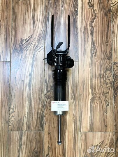 Передний левый амортизатор на Cayenne 955,957