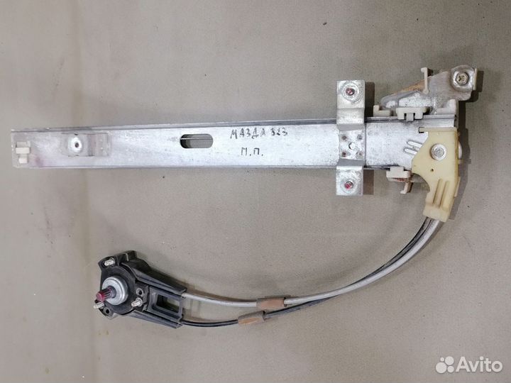 Стеклоподъемн.перед.прав.Mazda 323 1989