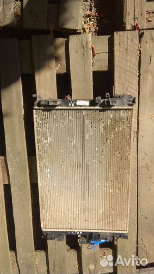 Радиатор Рено Логан