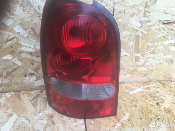 Фонарь левый Ssangyong Rexton 2 2.7D 2008