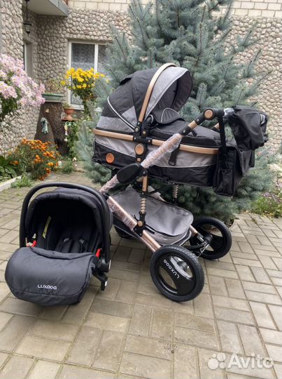 Коляска Люксмам модель 510 (черная на зол. )