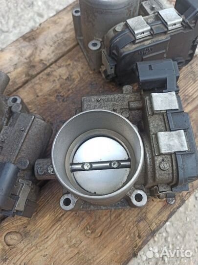 Заслонка дроссельная электрическая Шкода Карог