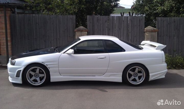 Передние крылья +25мм. на Nissan Skyline R34