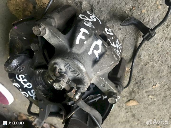 Суппорт на toyota vitz SCP90 2szfe