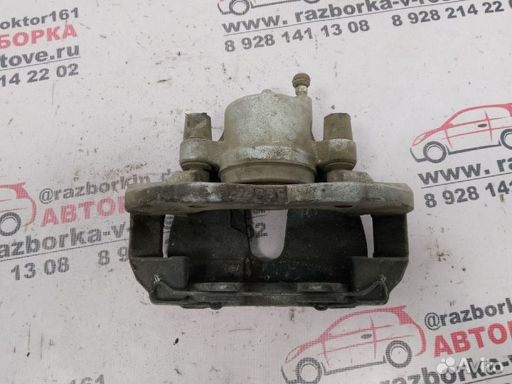 Суппорт передний правый Mazda 3 BK