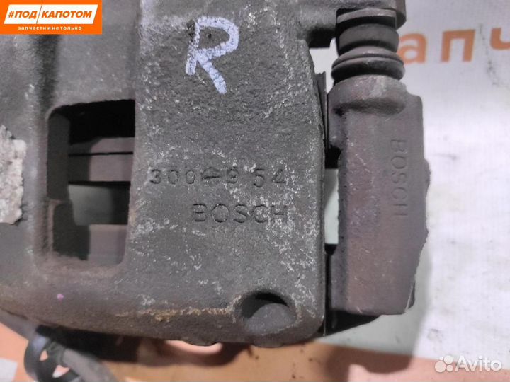 Суппорт тормозной передний правый Peugeot 207