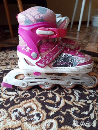 Роликовые коньки