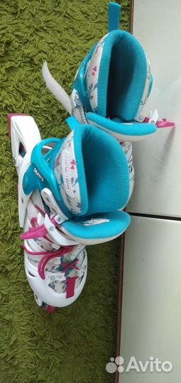 Роликовые коньки