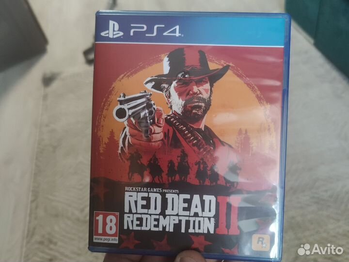 Диск с игрой RedDead Redemption 2 на PlayStation