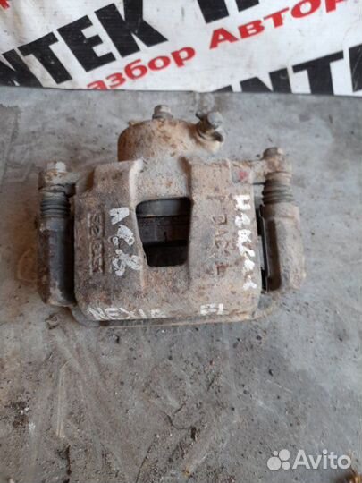 Суппорт передний левый Daewoo Nexia N150 2012