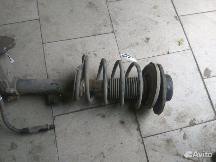 Амортизатор стойка передний левый Пежо 206