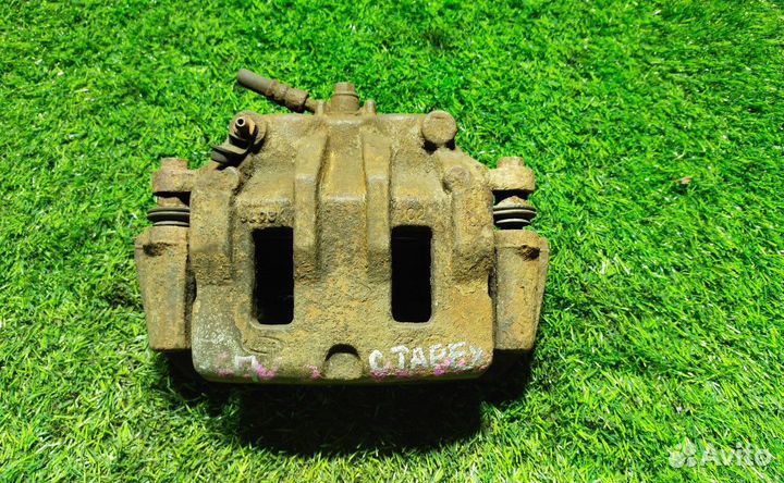 Суппорт тормозной передний левый Hyundai Starex