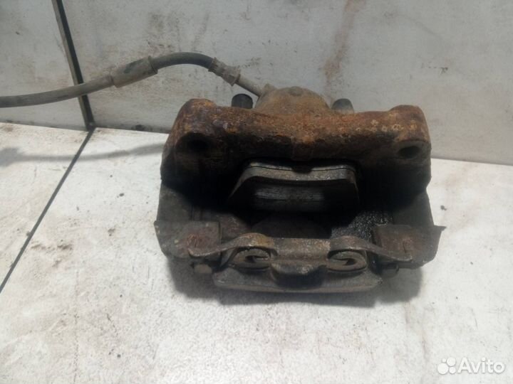 Суппорт тормозной передний левый Volkswagen T5