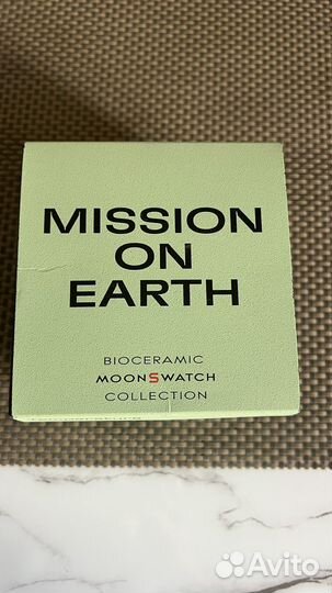 Часы swatch omega earth