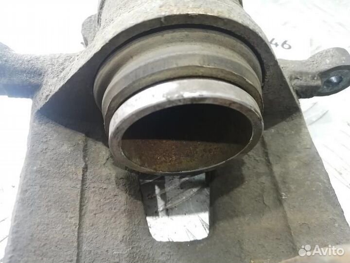 Суппорт тормозной передний левый Chevrolet Lacetti