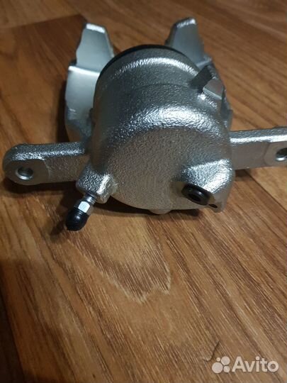 Суппорт тормозной передний рено