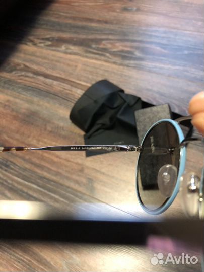 Очки Prada
