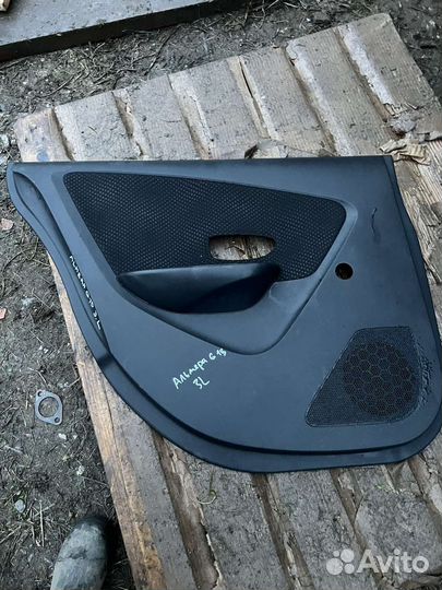 Обшивка двери задняя левая Nissan Almera G15