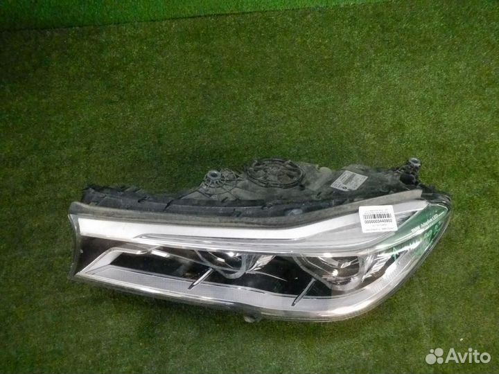 Фара левая BMW 7-Series