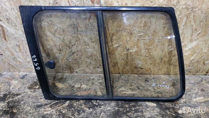 Стекло кузовное заднее левое Mitsubishi Pajero