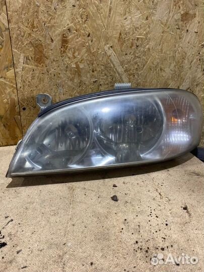 Фара передняя левая Kia Spectra седан S6D 2006