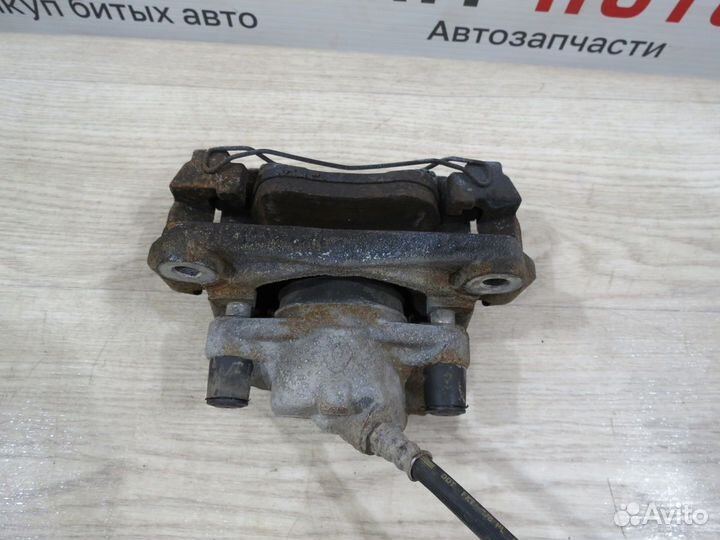 Суппорт тормозной передний левый Renault Duster