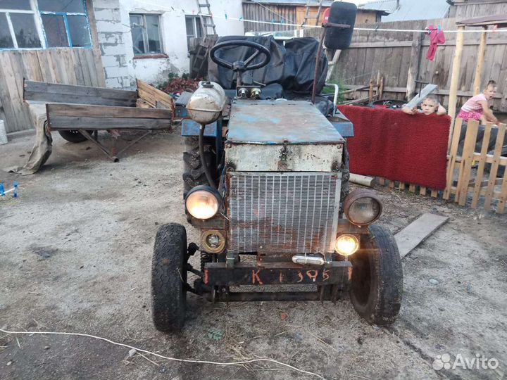 Мини-трактор, 1999