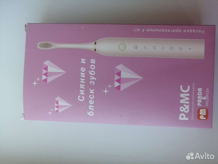 Электрическая зубная щетка