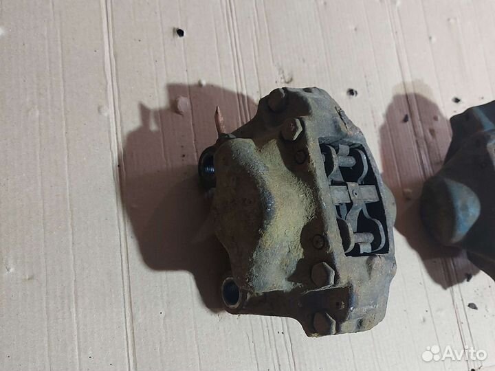 Суппорт задний правый; левый Опель; Вектра б