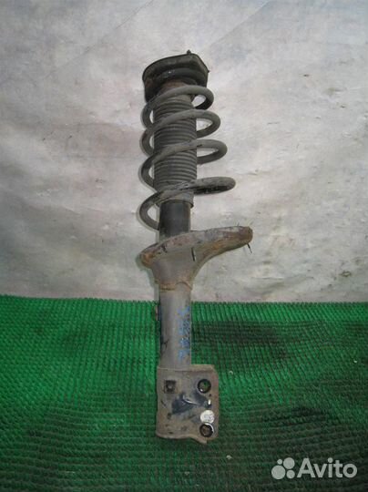 Стойка амортизатора задняя левая Hyundai Tucson