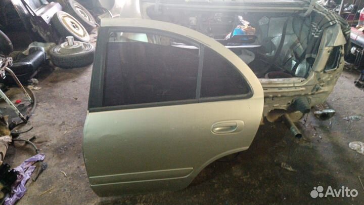 Левая задняя дверь Ниссан Санни Н16