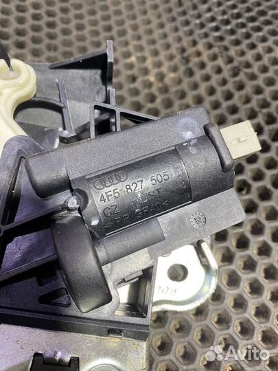 Замок крышки багажника Volkswagen Passat B6