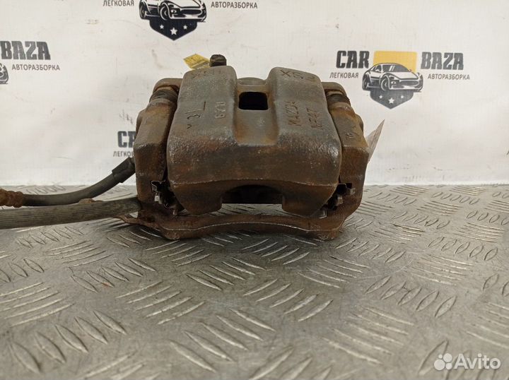 Суппорт тормозной передний левый L Mazda MX-5