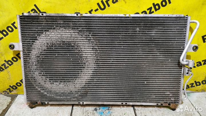 Радиатор кондиционера освновной Kia Карнивал 1