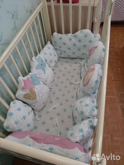 Детская кроватка с поперечным маятником