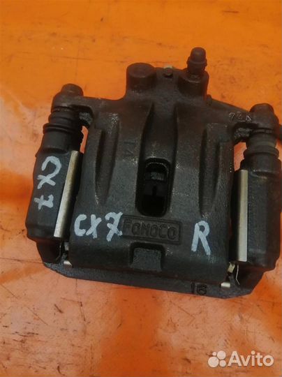 Суппорт тормозной задний правый Mazda CX 7 (2006