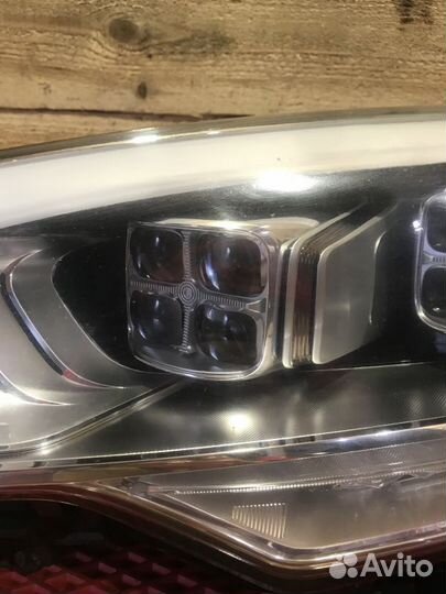 Фара левая Kia Quoris