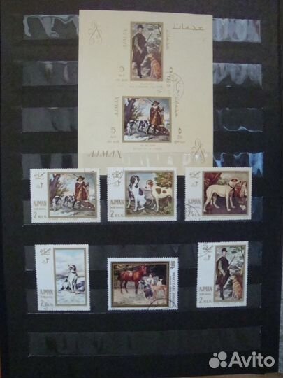 Коллекция марок с собаками