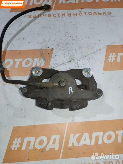 Суппорт тормозной передний правый Nissan X-Trail