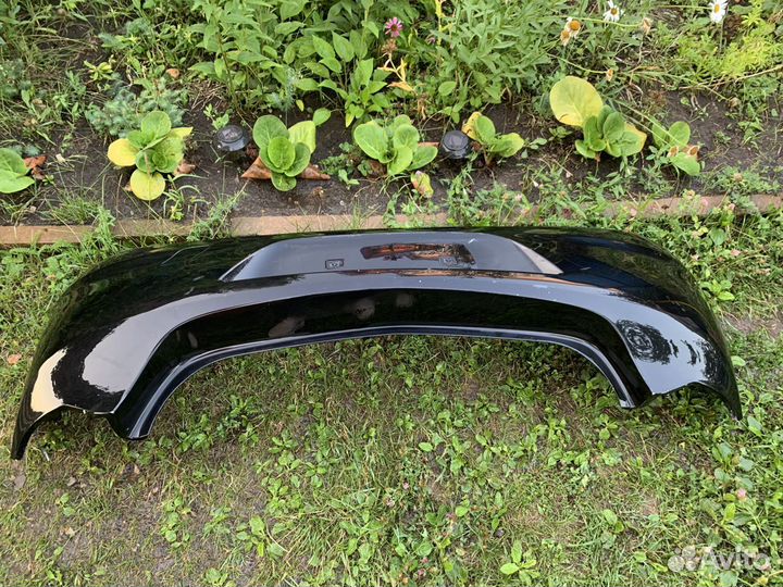 Бампер задний чёрный Opel Astra