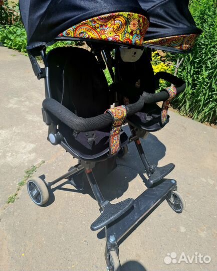 Коляска для двойни погодок