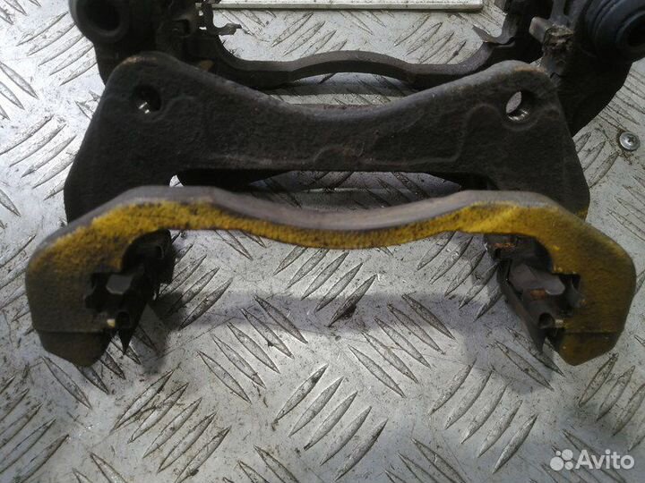 Скоба тормозного суппорта Mitsubishi Lancer X