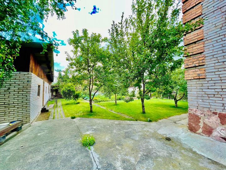 Коттедж 348 м² на участке 11,3 сот.