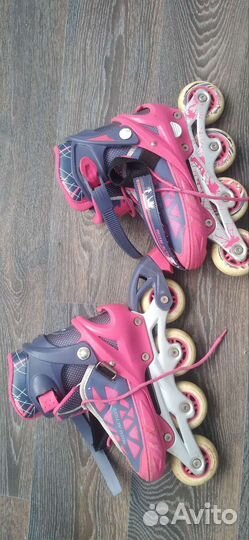 Роликовые коньки