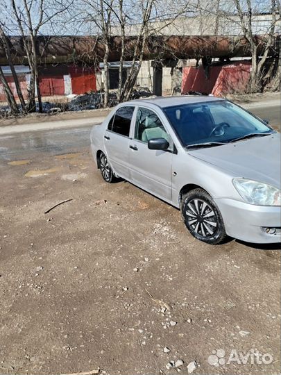 Mitsubishi Lancer 1.3 МТ, 2005, 247 000 км