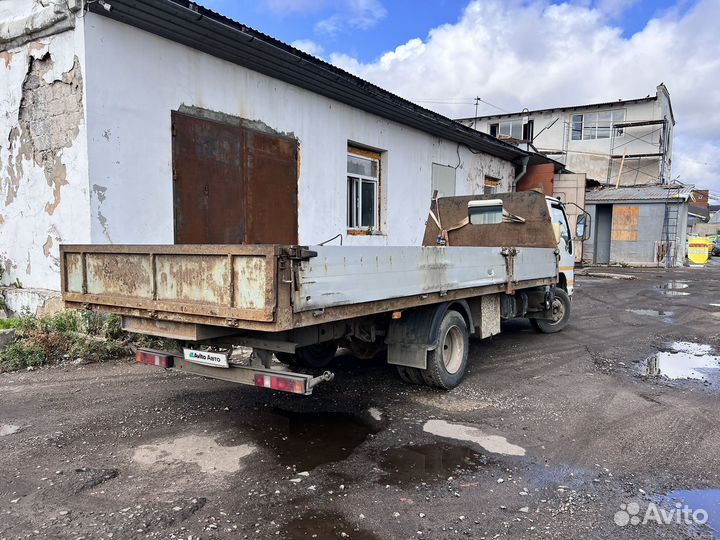 Бортовой грузовик Isuzu NQR75P, 2009